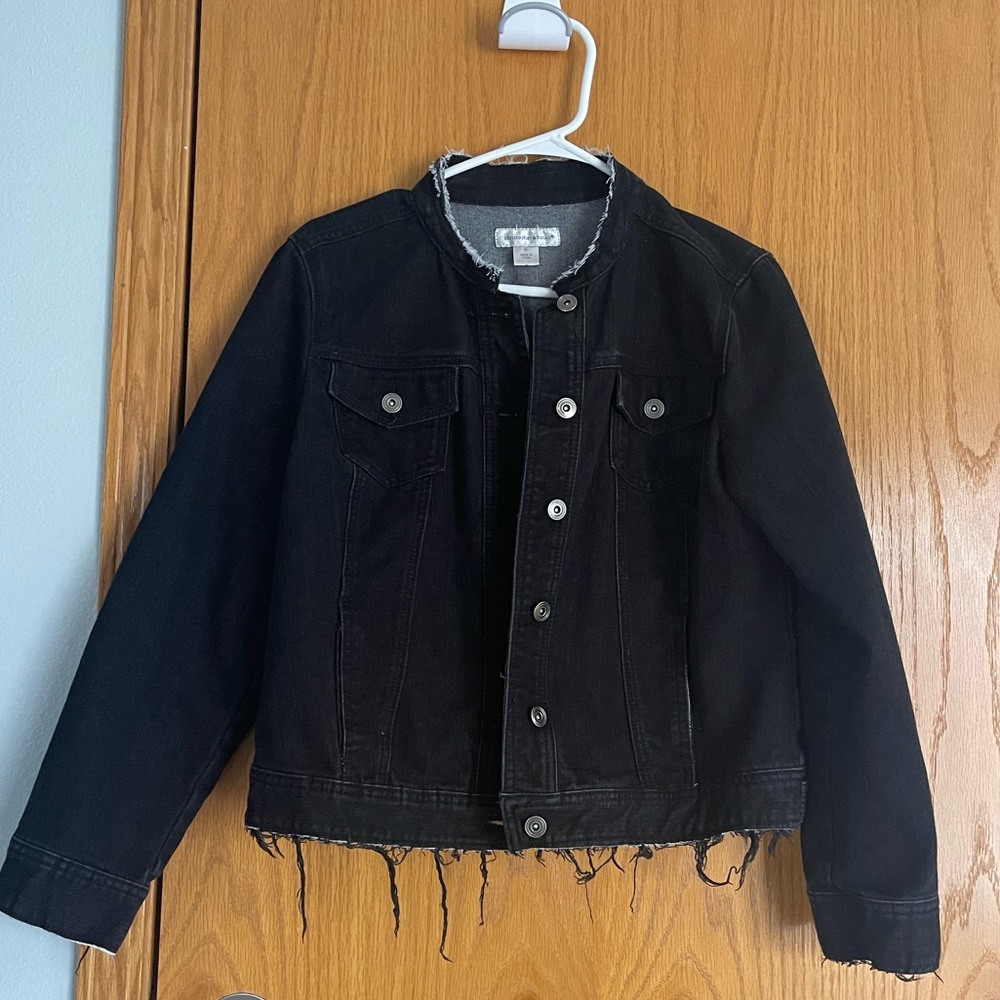 Distressed denim jacket